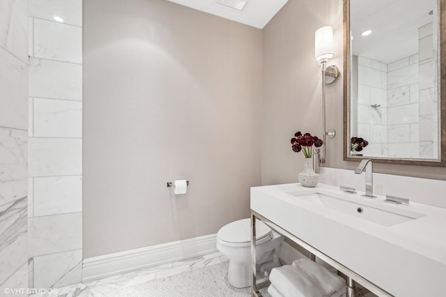 full bathroom featuring visible vents, baseboards, toilet, marble finish floor, and vanity