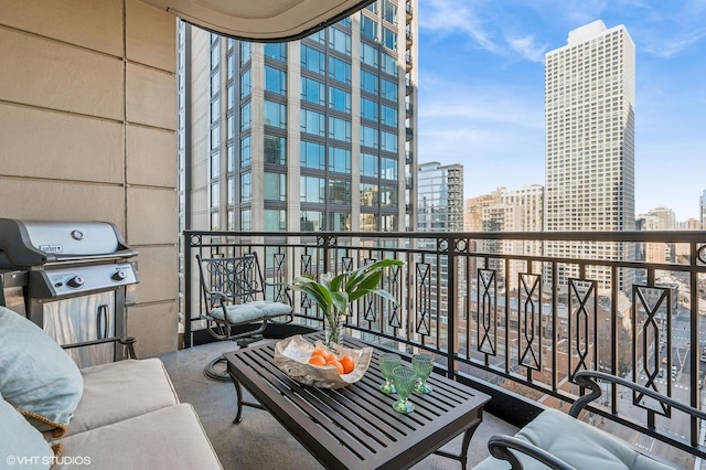 balcony with a grill and a view of city