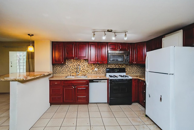 kitchen with sink, tasteful backsplash, kitchen peninsula, pendant lighting, and white appliances