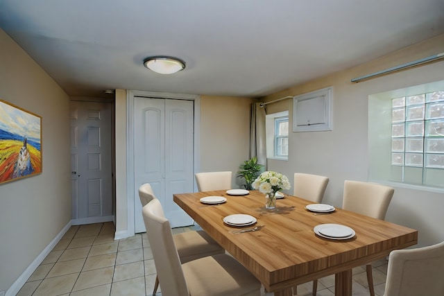 dining room featuring light tile patterned flooring