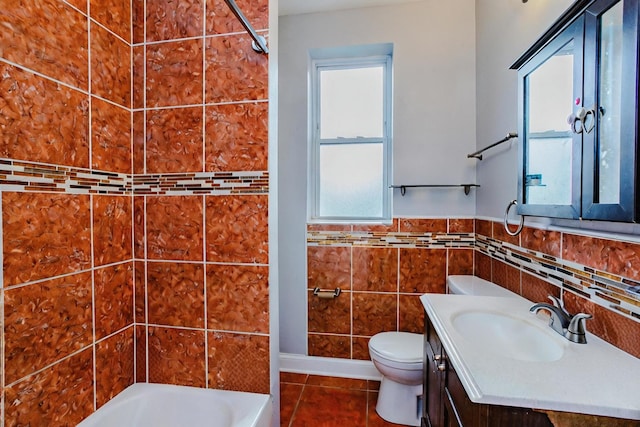 full bathroom with tile patterned floors, vanity, separate shower and tub, tile walls, and toilet