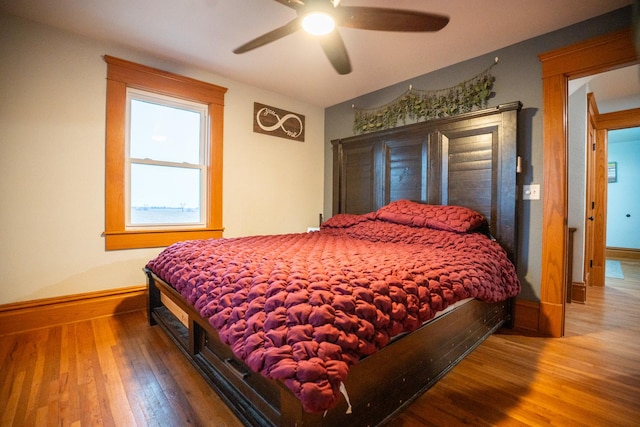 bedroom featuring ceiling fan and wood-type flooring