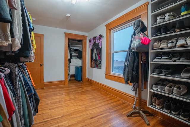 spacious closet featuring hardwood / wood-style floors