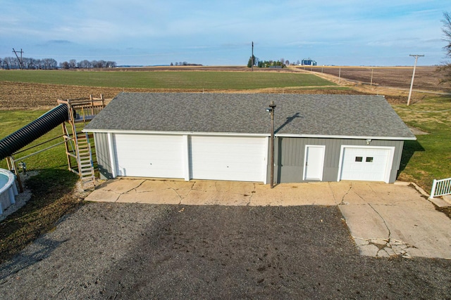 garage with a rural view