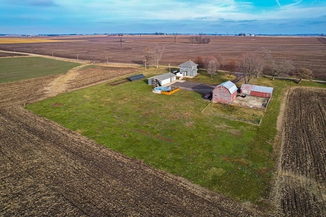 birds eye view of property featuring a rural view