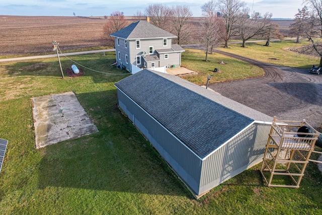 birds eye view of property featuring a rural view