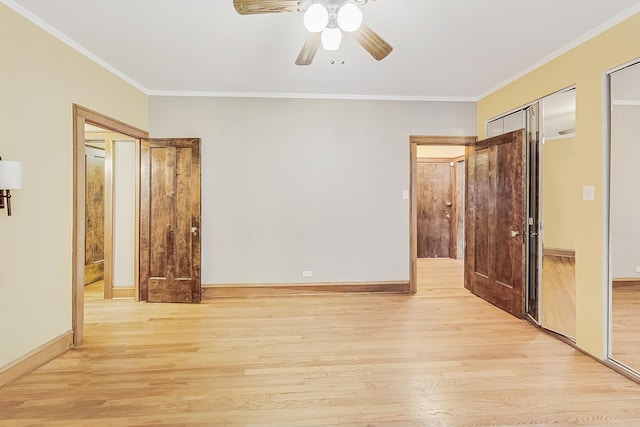 unfurnished bedroom with ceiling fan, ornamental molding, and light wood-type flooring