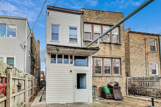 rear view of house featuring a patio area