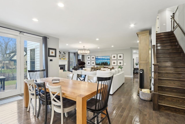 dining space with hardwood / wood-style floors