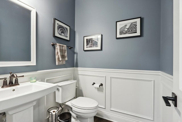 bathroom with sink and toilet