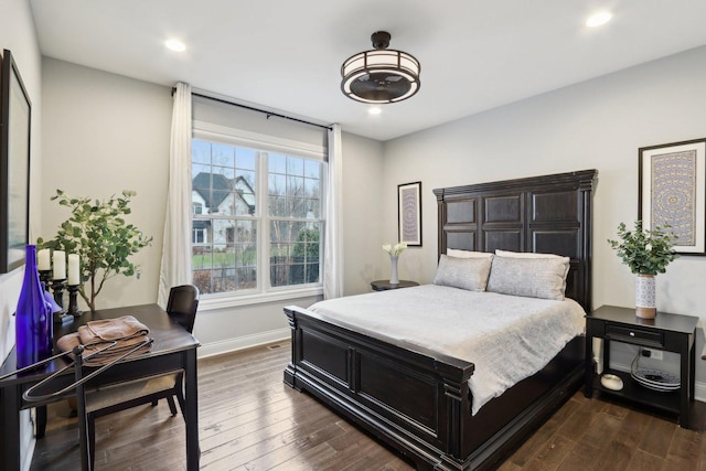 bedroom featuring dark wood-type flooring