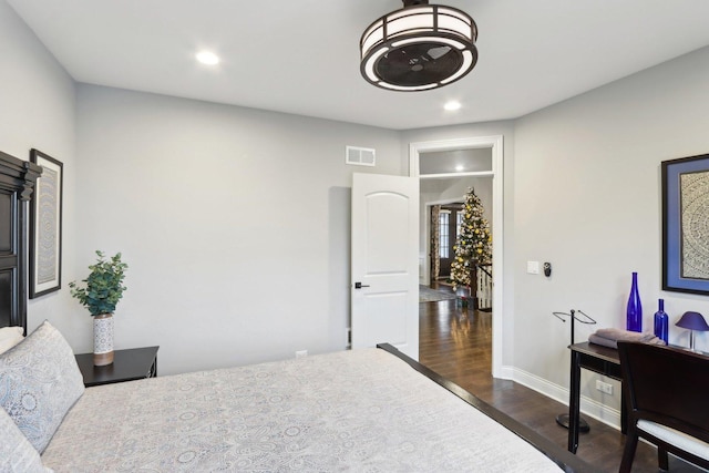 bedroom featuring dark hardwood / wood-style floors