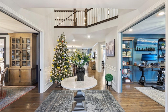 foyer entrance featuring dark hardwood / wood-style floors