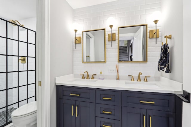 bathroom with toilet and vanity