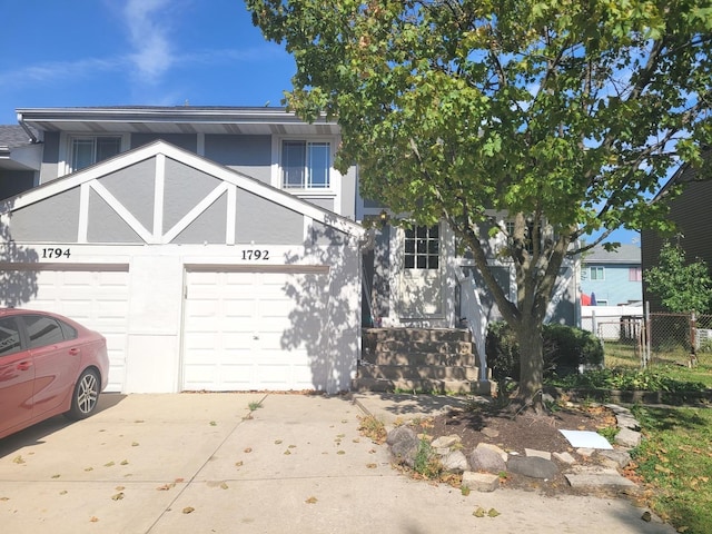 view of front of property with a garage