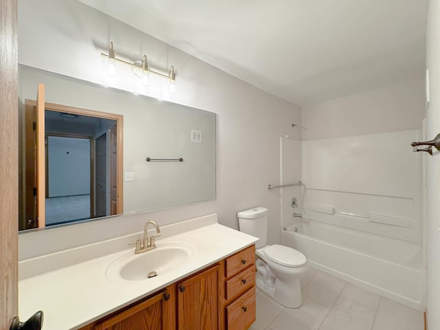 full bathroom featuring tile patterned flooring, vanity, toilet, and tub / shower combination