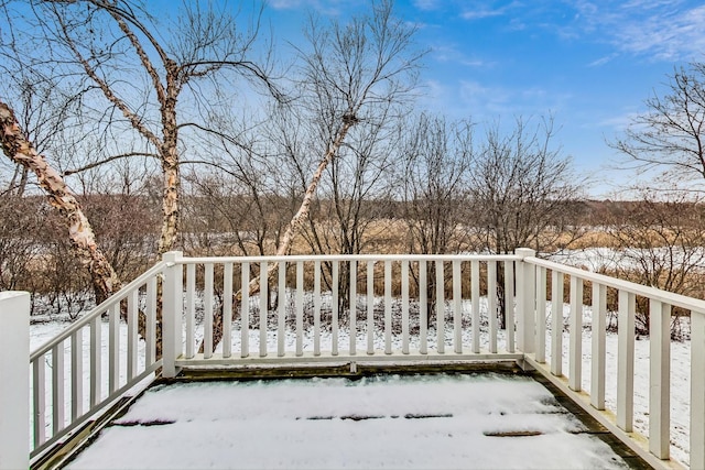 view of snow covered deck