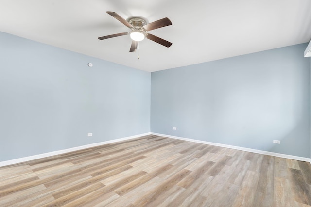 unfurnished room featuring ceiling fan and light hardwood / wood-style floors