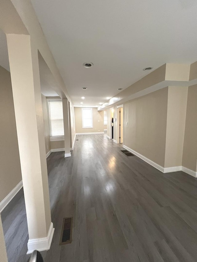 interior space with dark wood-type flooring