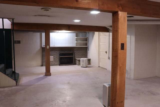 basement featuring a fireplace