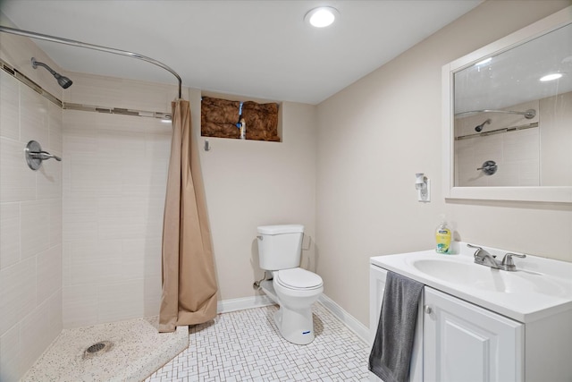 bathroom with curtained shower, tile patterned flooring, vanity, and toilet