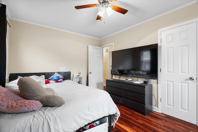 bedroom with ceiling fan, dark hardwood / wood-style flooring, and ornamental molding