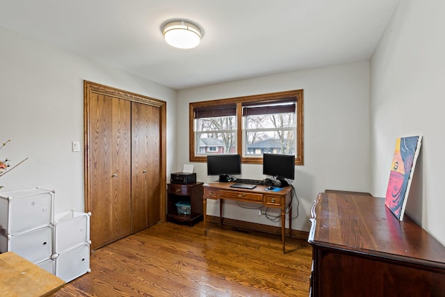 home office featuring dark wood-type flooring