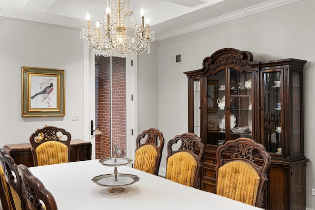 dining space featuring a notable chandelier and ornamental molding