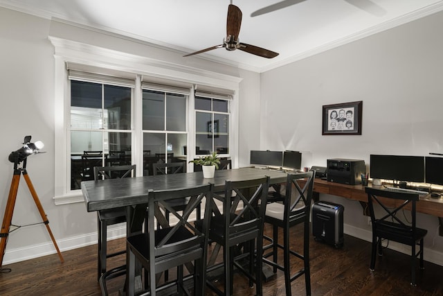 dining room with ceiling fan, dark wood-type flooring, and ornamental molding