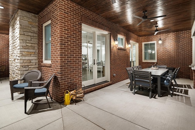 view of patio with ceiling fan and french doors