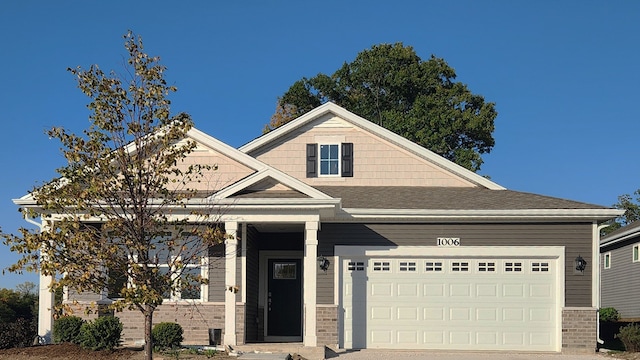 craftsman-style home with a garage