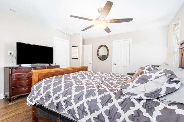 bedroom featuring ceiling fan and dark wood-type flooring