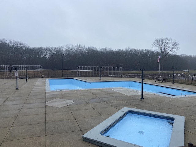 view of pool with a patio area