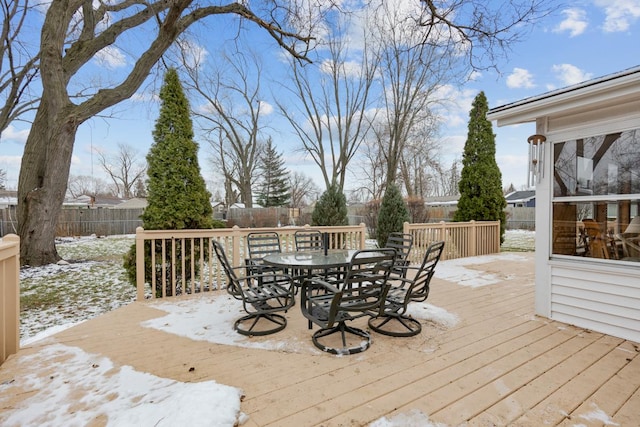 view of snow covered deck