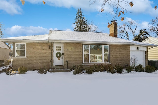 ranch-style home with a garage