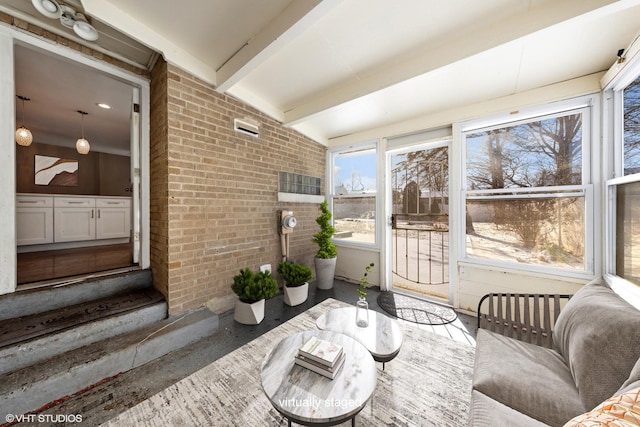 sunroom / solarium with lofted ceiling with beams