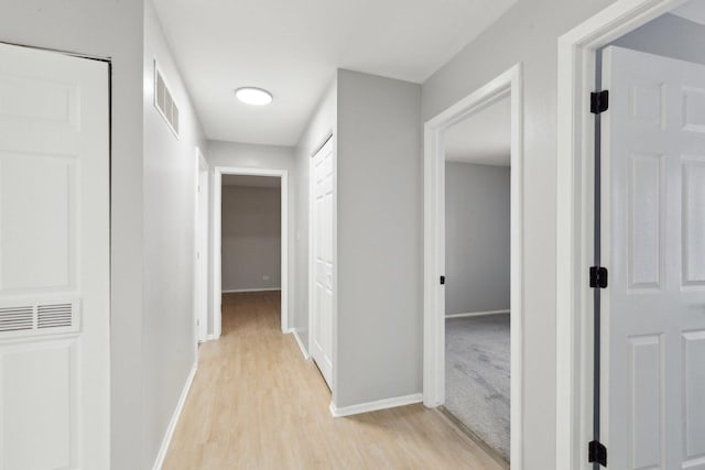 hall featuring light wood-type flooring