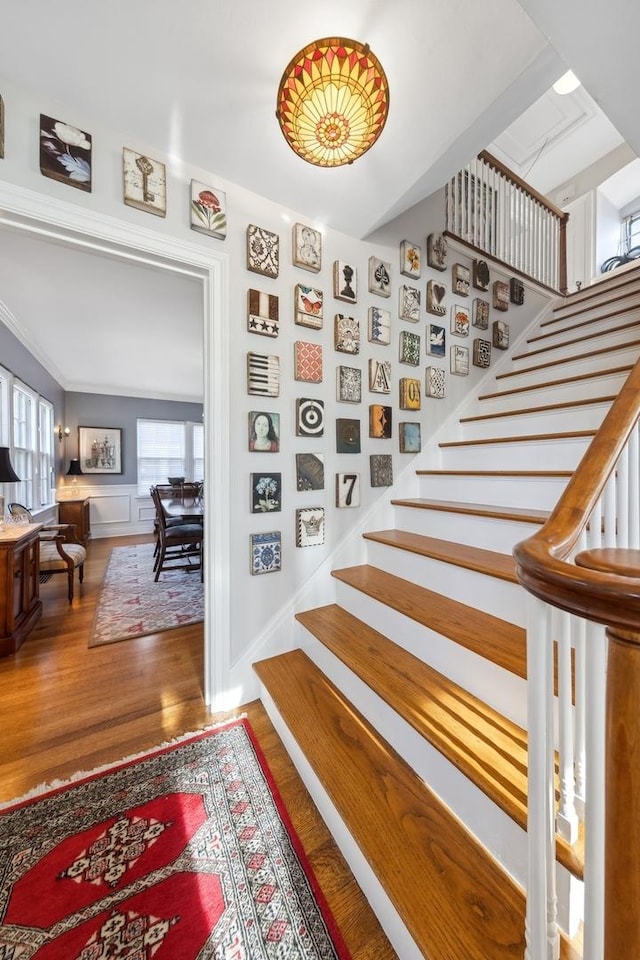 staircase featuring hardwood / wood-style floors