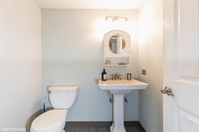 bathroom with sink and toilet