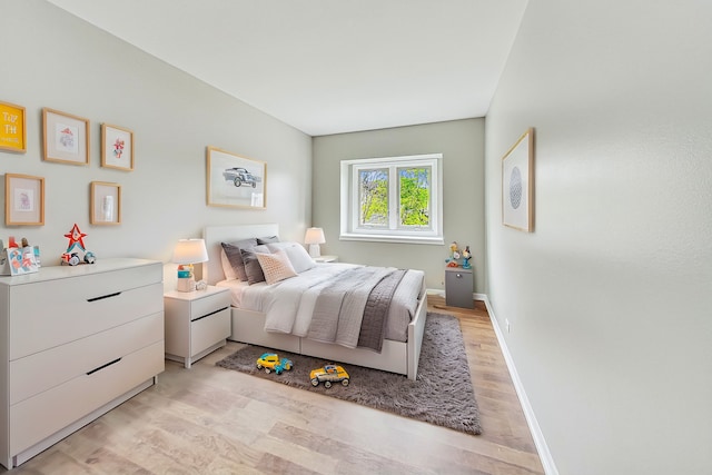 bedroom featuring light wood-type flooring