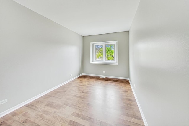 empty room featuring light hardwood / wood-style floors