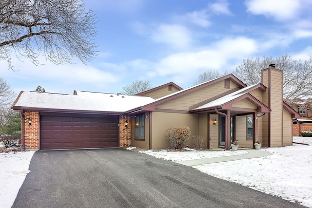 ranch-style home with a garage