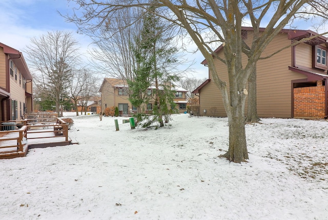 view of yard covered in snow