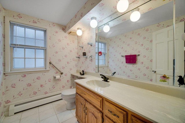 bathroom featuring tile patterned flooring, vanity, a baseboard radiator, and toilet