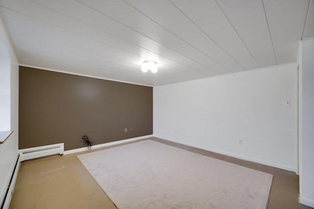 empty room with a baseboard heating unit