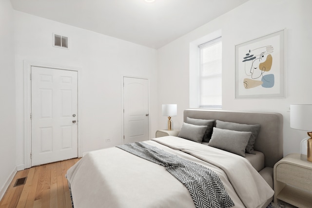 bedroom featuring light hardwood / wood-style floors