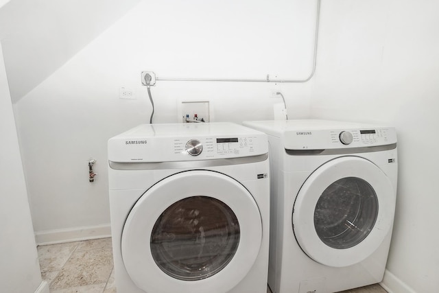 washroom featuring separate washer and dryer