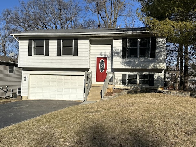 split foyer home featuring a garage