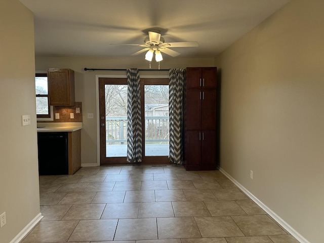 interior space featuring ceiling fan and light tile patterned flooring