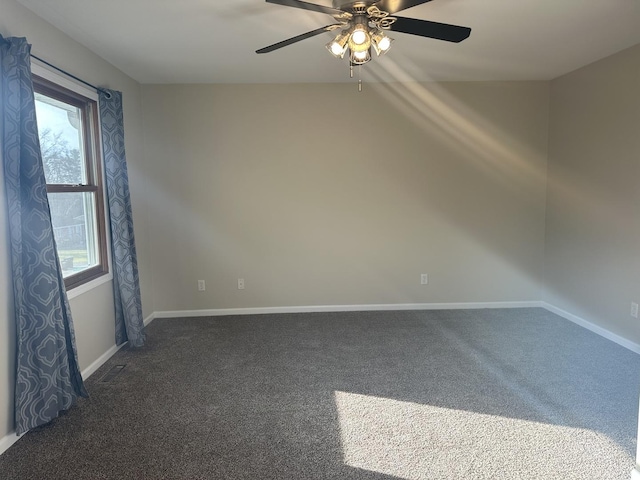 carpeted empty room with ceiling fan